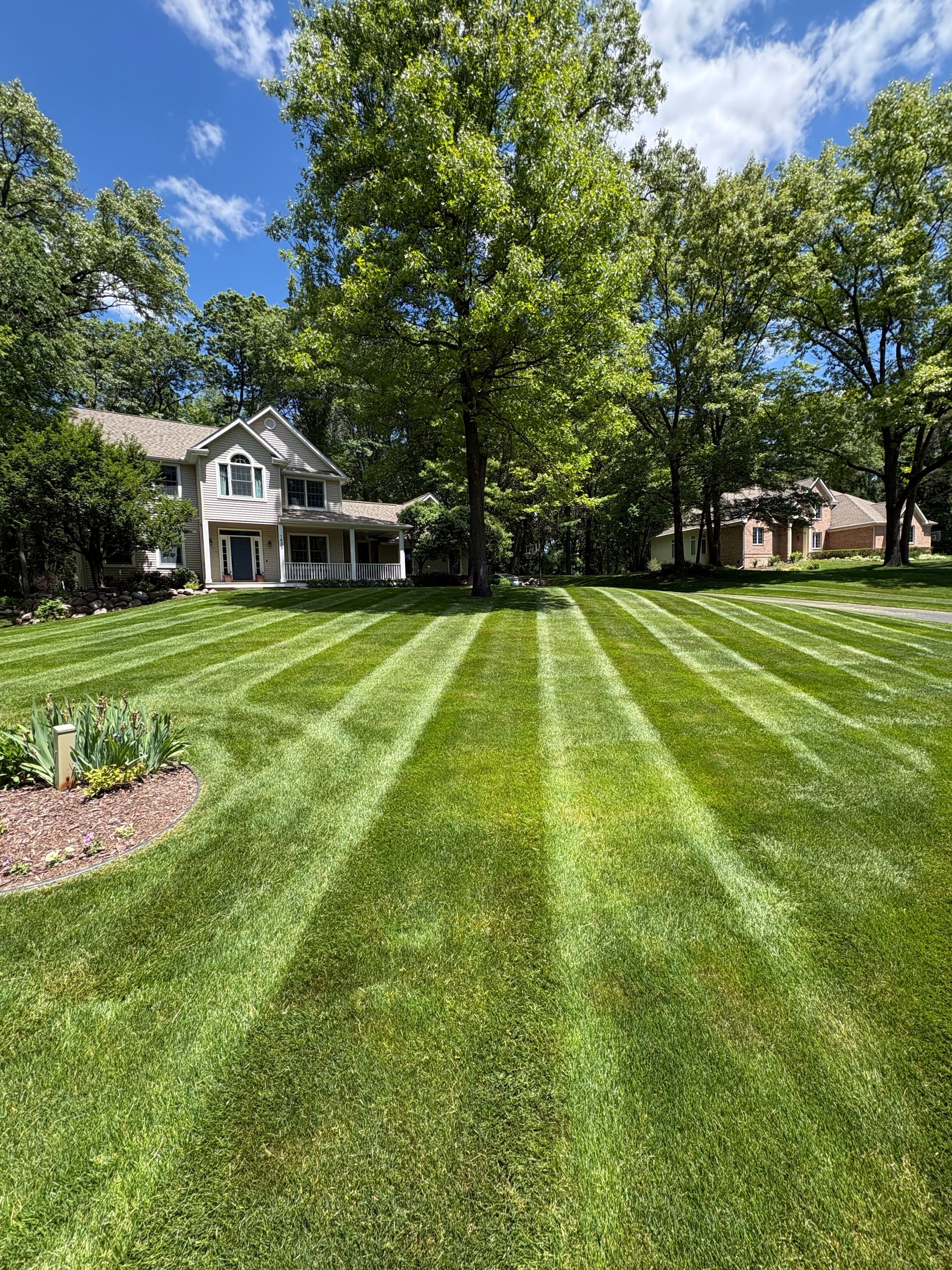 Crisp stripes leading right up to the front door — the Northern Stripes signature look.